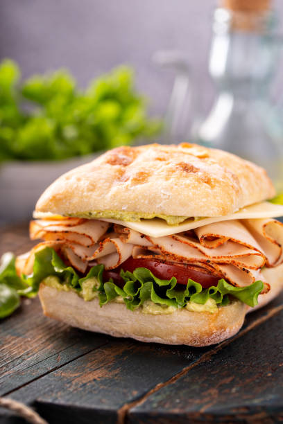 istock Fresh and healthy pesto turkey sandwich 1347729134