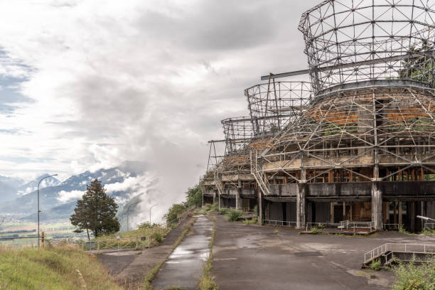 Side view of deserted dismantled cooling towers