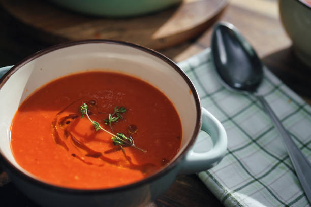 Preparing Creamy Tomato Soup in Domestic Kitchen