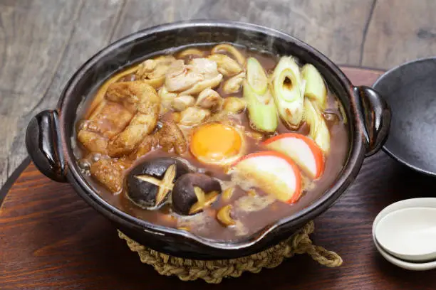 Miso Nikomi Udon is Japanese noodle hotpot dish stewed in miso broth. and that is very popular in Nagoya area.
Ingredients are chicken, shiitake mushrooms, fried tofu, kamaboko, egg and green onion.