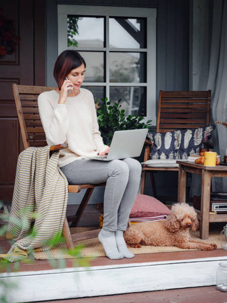 istock female studying at home with laptop. 1347740622