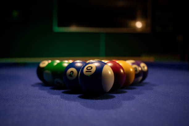 istock game with colorful pool balls on the blue table. 1347740875