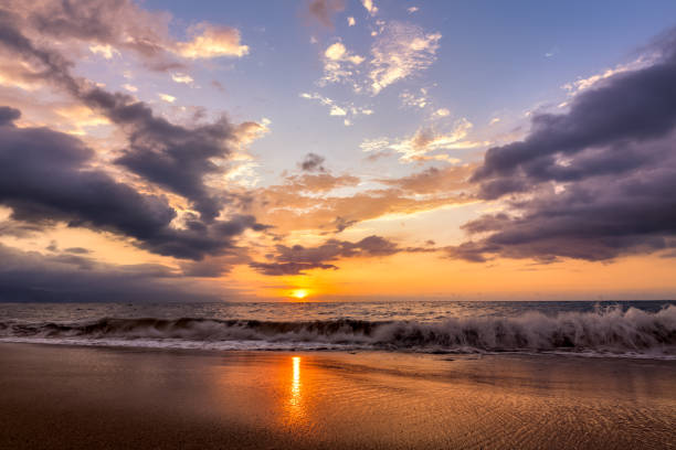 istock Beach Sunset Ocean Wave Seascape 1347744633