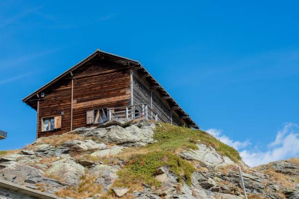 istock old wooden cottage at Bernina Pass 1347744677