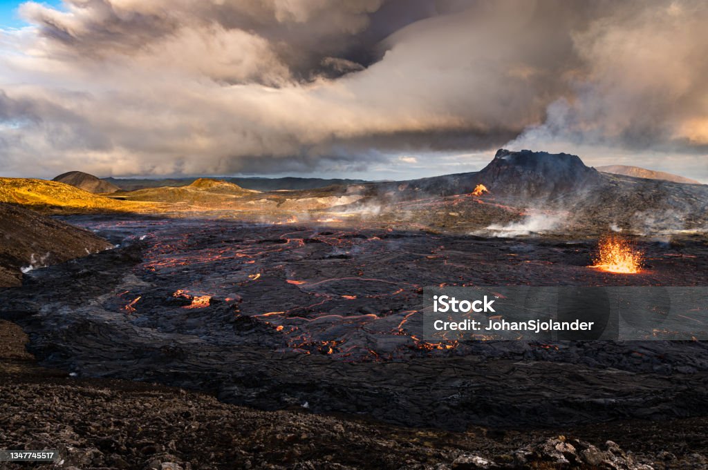 Fagradalsfjall volcano in Iceland Sunset view of lava field in front of Fagradalsfjall volcano in Iceland. Fagradalsfjall Stock Photo