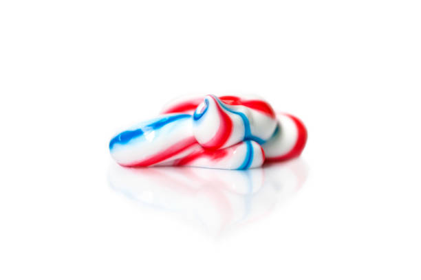 istock Toothpaste sample isolated on white background. Tricolor tooth care cream smudge. Dental hygiene product 1347746588