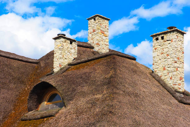 istock Traditional thatched house. House with thatched roof 1347746921