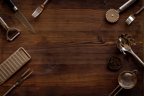 istock Cooking background with metal kitchen utensils and cookware 1347748117