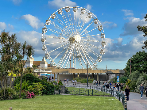 Bournemouth, Dorset, England - June 2021: Giant ferris wheeel on the seafront at the entrance to the town's public park