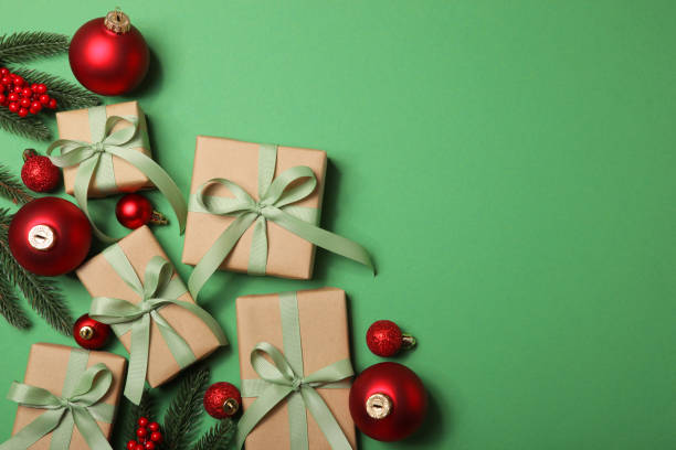 istock Christmas decorations and gifts on a colored background top view 1347752409