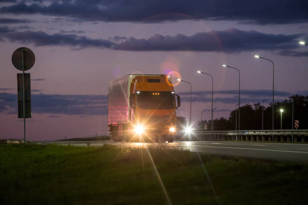 istock truck moves at night 1347753451