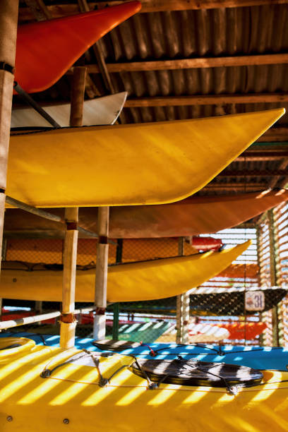 istock Collection of kayaks on shelves in storage 1347753596