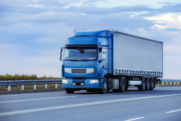istock Truck driving on the highway 1347753703