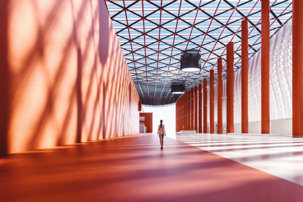 Lone businesswoman walking in empty exhibition hall Lone businesswoman walking in empty exhibition hall, 3D generated image. generic description stock pictures, royalty-free photos & images