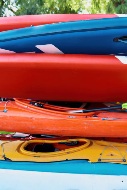 istock Set of colorful kayaks outdoors on beach coast 1347758229