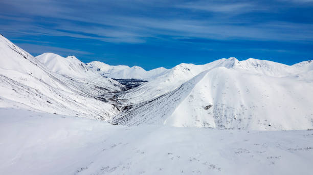 istock View of the mountain landscape under the blue sky after spring snowfall. 1347758596