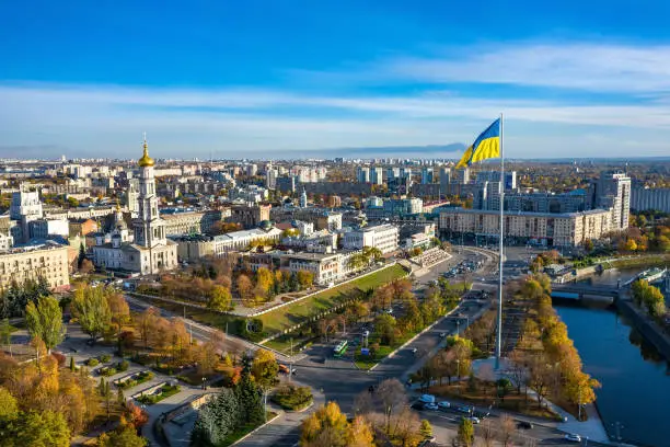 Photo of Aerial view to highest ukrainian flag on embankment in Kharkiv