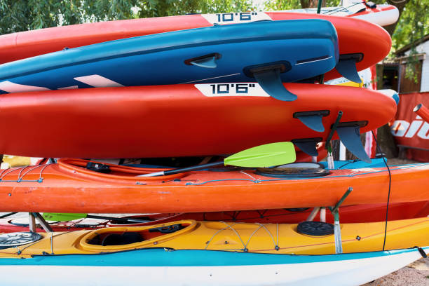 istock Set of colorful kayaks outdoors on sandy coast 1347758808