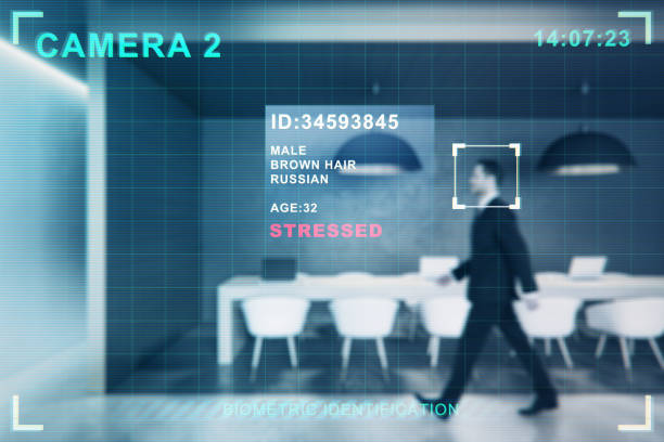 istock Security camera recognizing attractive young european business man walking in blurry office interior. ID, scanning and cctv concept. Double exposure. 1347760915