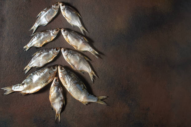 istock Concept of Christmas trees made from products. Dried fish. 1347766951