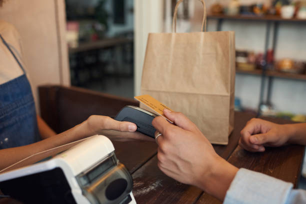 istock Paying With Wireless Card In Shop 1347767806