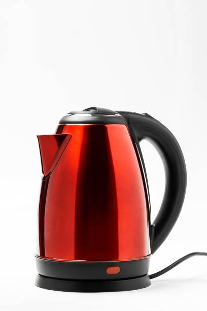 istock Red Stainless electric kettle isolated on white background 1347780597