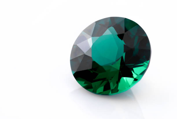 istock Emeralds gemstone jewelry isolated on white background 1347784603