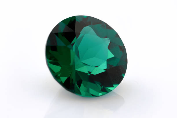 istock Emeralds gemstone jewelry isolated on white background 1347784608