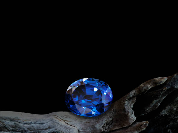 blue sapphire on old wooden with black background Thailand, sapphire, jewelry, gemstone blue saphire stock pictures, royalty-free photos & images