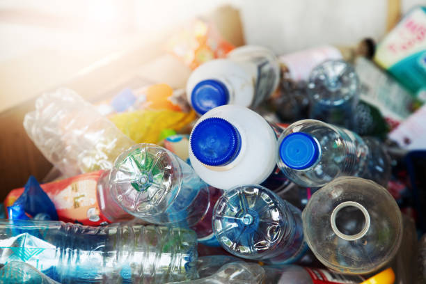 istock plastic bottle in recycle bin,waste management concept. 1347785756