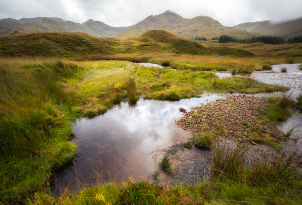 istock Scottish Highlands and Mountains in Mist 1347786481