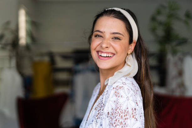 istock Smiling woman looking at camera 1347786719