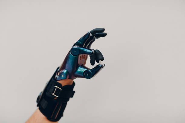 istock Young disabled man with artificial prosthetic hand in casual clothes. 1347788226