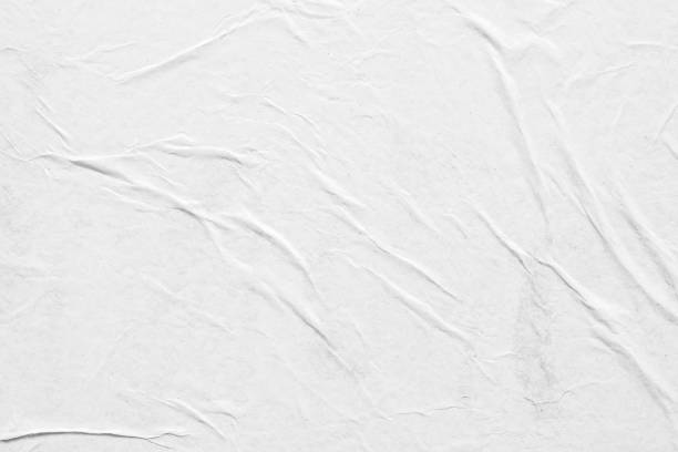istock white crumpled and creased paper poster texture background 1347788242