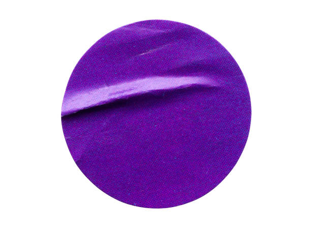 istock Blank purple round adhesive paper sticker label isolated on white background 1347788254