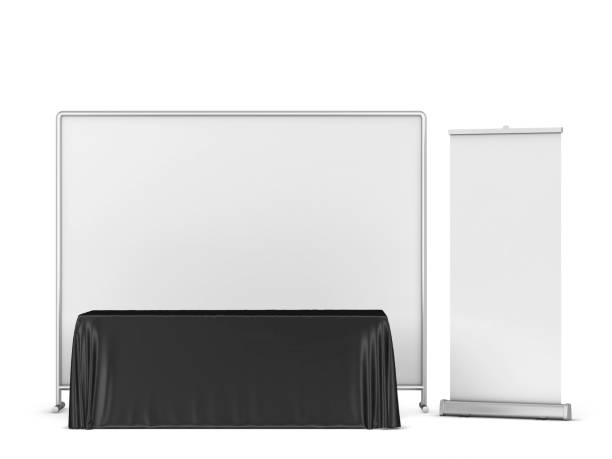 istock Blank tradeshow tablecloth with backdrop and rollup banners mockup 1347789094