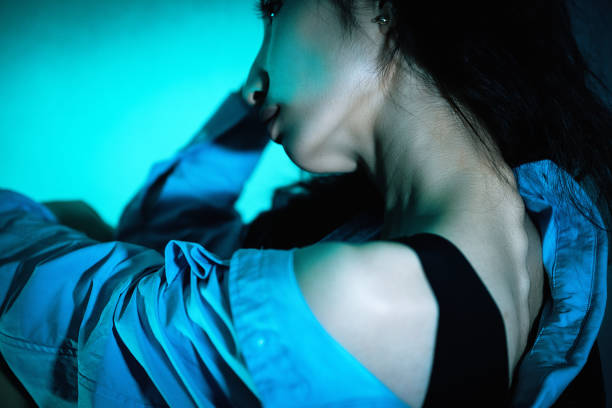 istock Beautiful women in neon lights 1347792857