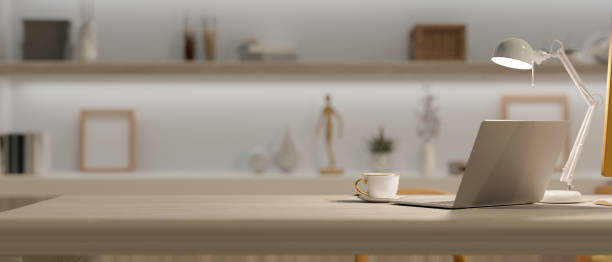 istock Elegance home office interior with laptop mockup and empty space on table 1347803623