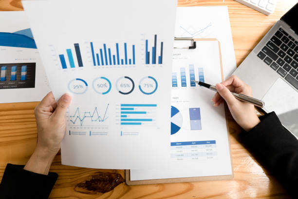 istock strategy analysis concept, Businessman working financial Manager Researching Process accounting calculate analyse market graph data stock information review on the table in office. 1347803663