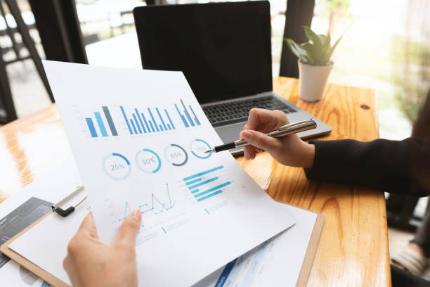 istock strategy analysis concept, Businessman working financial Manager Researching Process accounting calculate analyse market graph data stock information review on the table in office. 1347803667