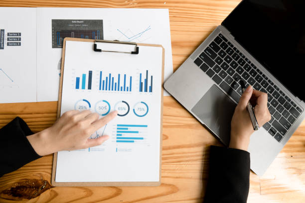 istock strategy analysis concept, Businessman working financial Manager Researching Process accounting calculate analyse market graph data stock information review on the table in office. 1347803673