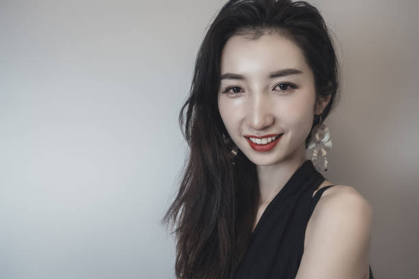 istock Beautiful, stylish women and a rose 1347805383