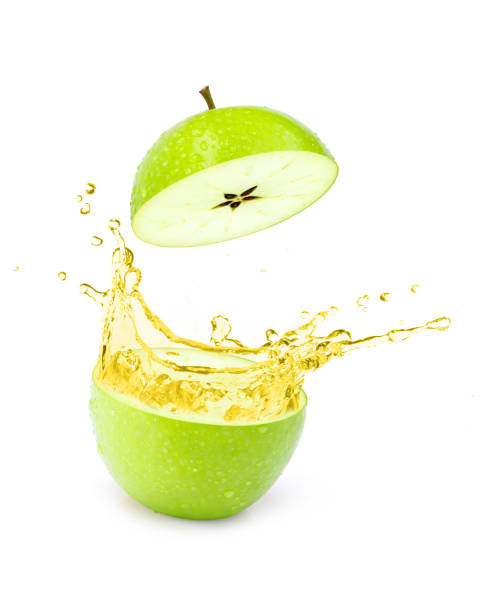 istock green apple juice or apple cider vinegar splashing isolated on white background. 1347810584