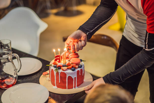 istock 6 birthday candles are lit on the cake 1347812926