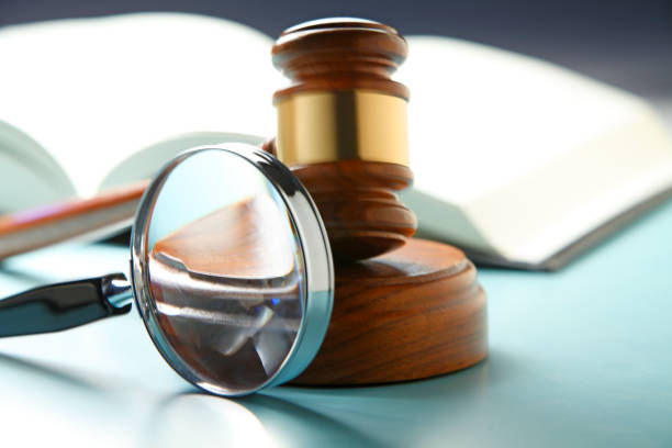 istock Gavel And Magnifying Glass 1347813871