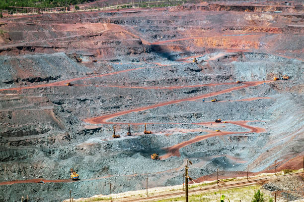 istock Iron ore extraction in the quarry of the Mikhailovsky mining and processing plant 1347815672