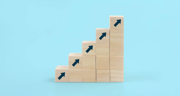 istock Wooden blocks chart steps with copy space. The business growth process 1347818865