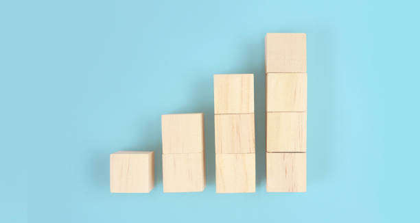 istock Wooden blocks chart steps with copy space. The business growth process 1347818874