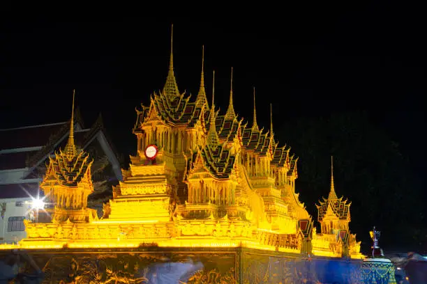 Photo of Wax Castle show at night in Wax Castle Festival is held annually at the end of the Buddhist Lent in Thailand.