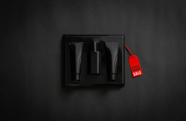 A black box of perfume with red price tag